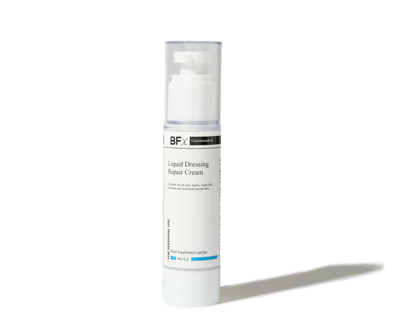 A white cylindrical pump bottle of BFX Cosmeceutical Liquid Dressing Repair Cream, shown on a clean white background with a soft shadow to the right.