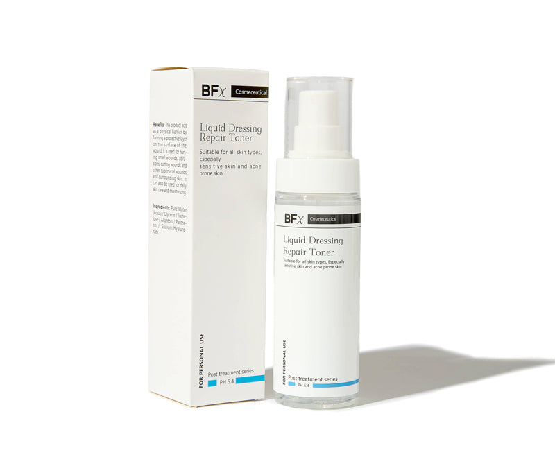 A skincare product bottle of BFX Clinical Liquid Dressing Repair Toner next to its white packaging box, set against a clean white background with a soft shadow.