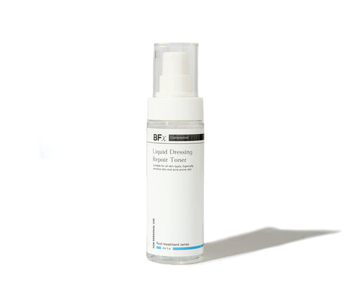 A white cylindrical pump bottle of BFX Liquid Dressing Repair Toner with a clear cap, shown on a clean white background with a soft shadow to the right.
