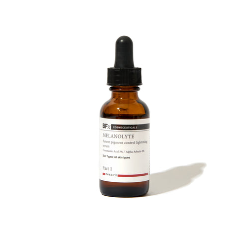 An amber glass dropper bottle of BFx Cosmeceuticals Melanolyte, Part 1, with a black dropper cap and white label, set against a plain white background with a soft shadow.