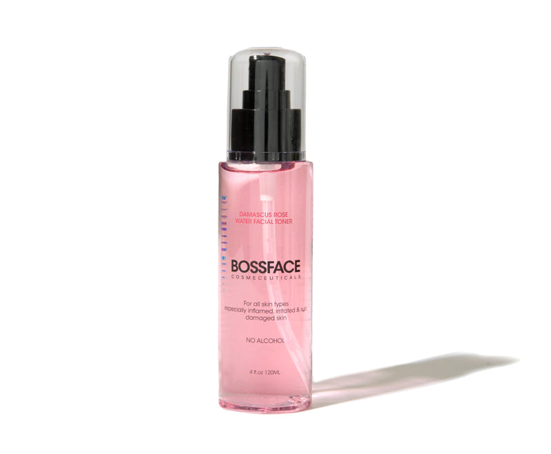 A pink bottle of Bossface Cosmetics Shimmering Rose Facial Toner with a black pump and clear cap, set against a plain white background with a soft shadow.