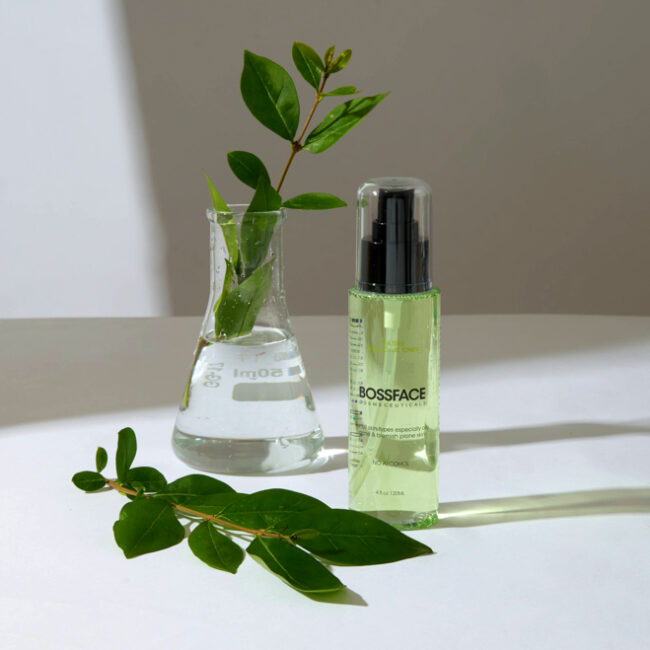 BOSSFACE Tea Tree & Salicylic Toner with test tube glass and leaves